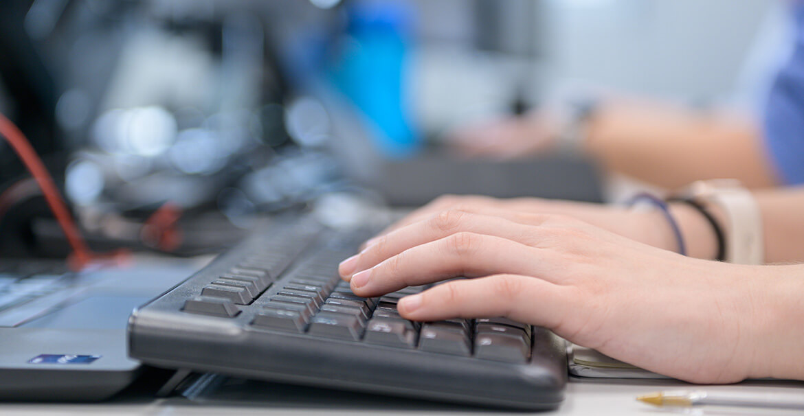 Person using keyboard